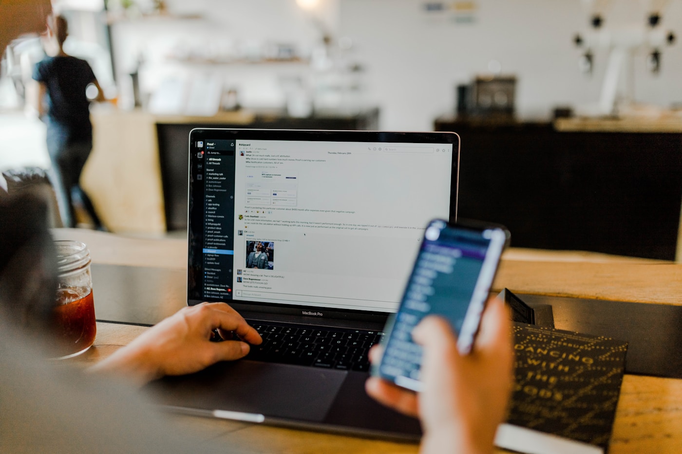 Laptop and phone showing business communication tools
